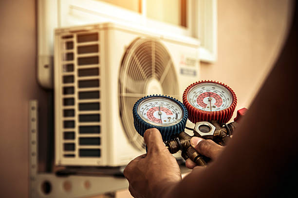 Professional Air Conditioning Service technician working in Canton, SD